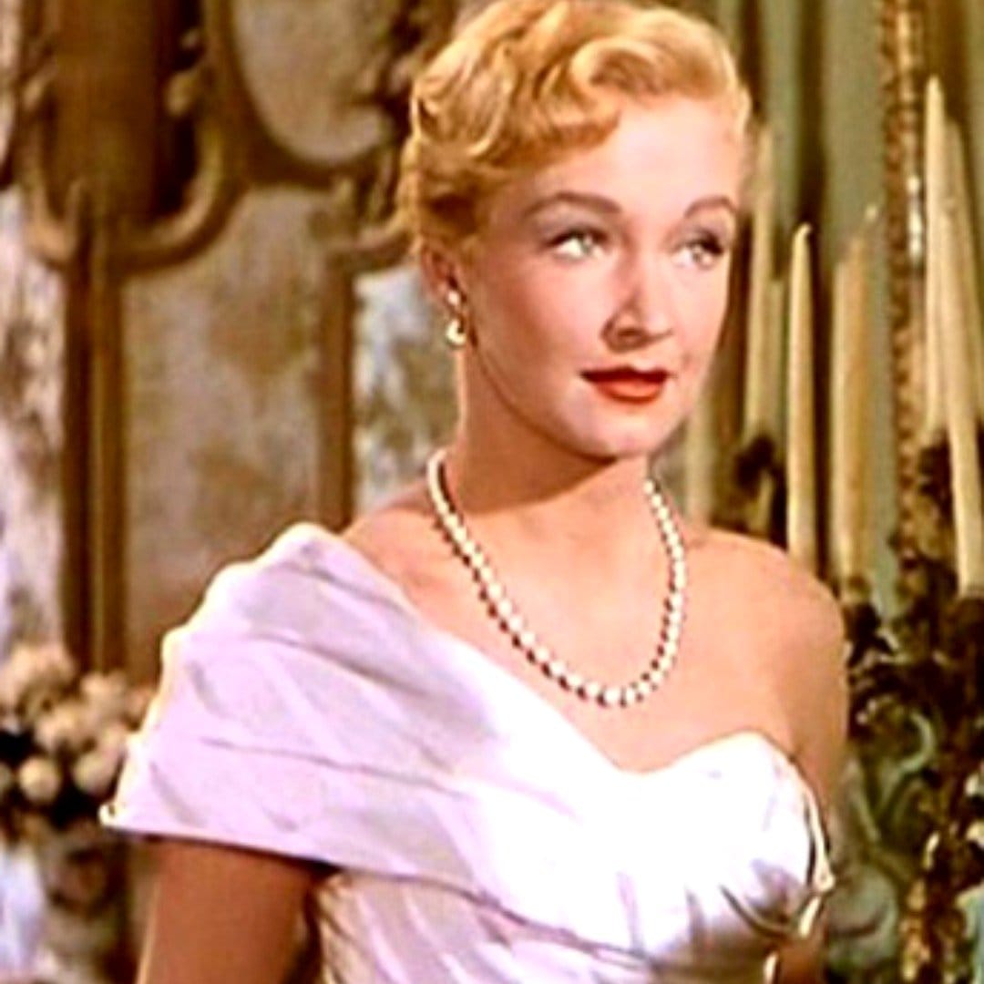 lady palm in office setting