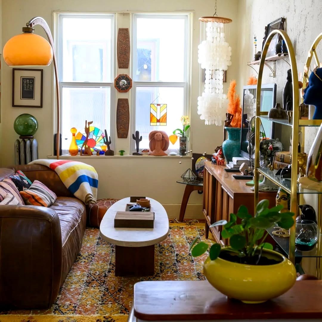 living room bookshelf with woodblock bookend planters