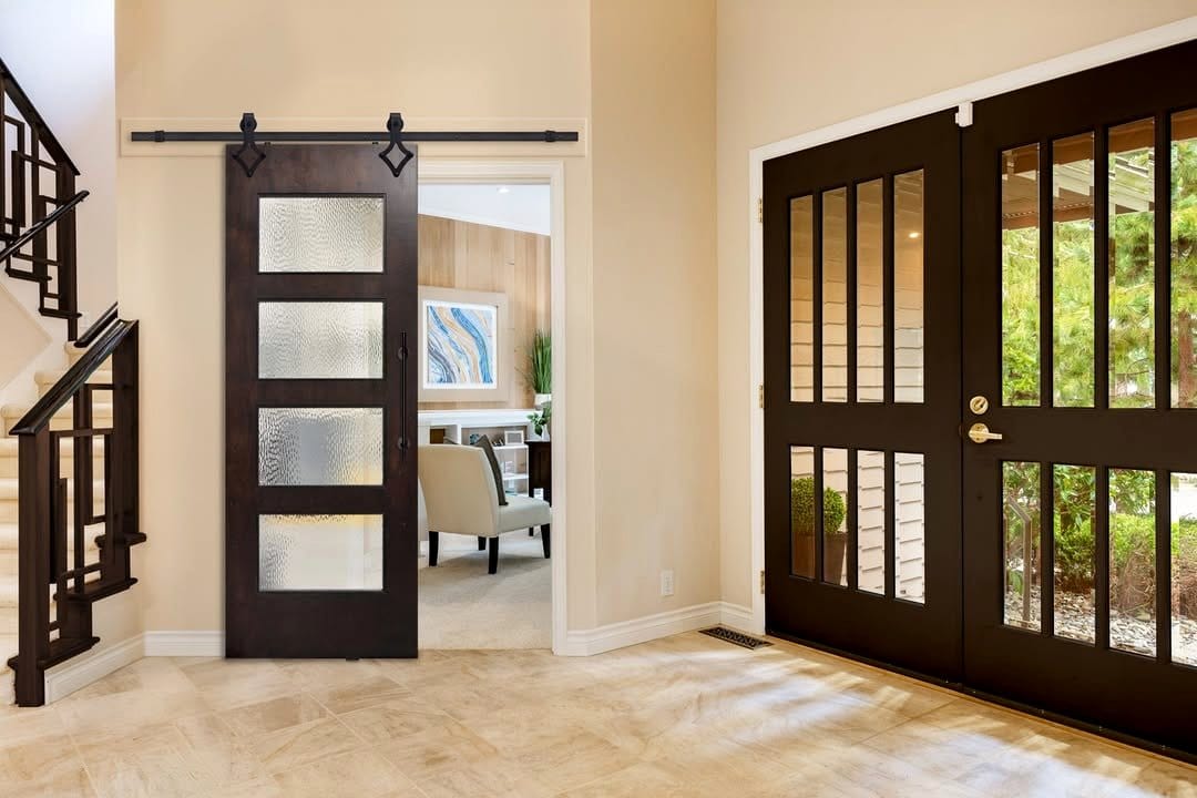 Reclaimed barn door with mounted planters