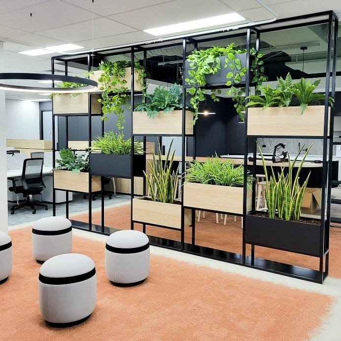 Contemporary plant-filled room divider