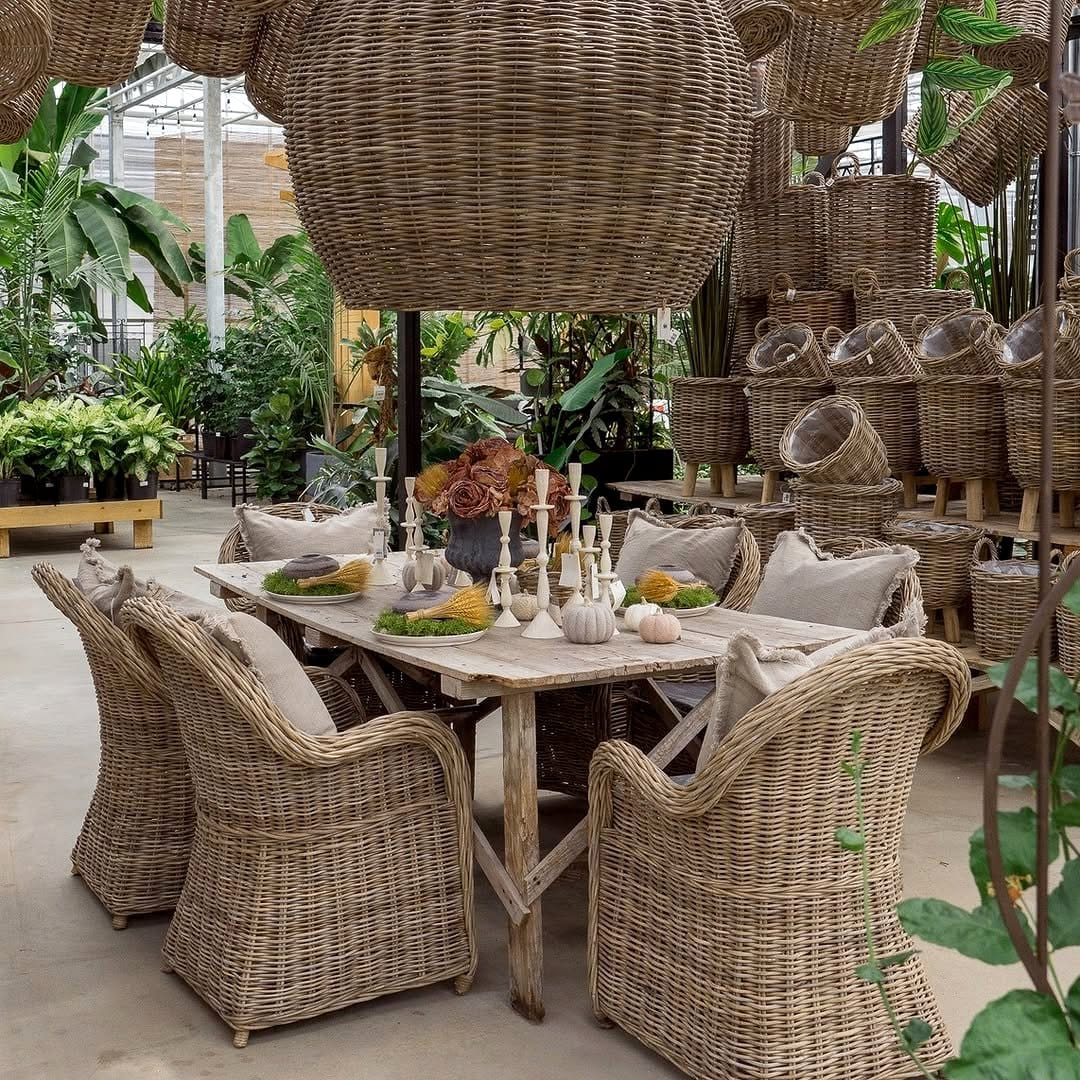 Rustic wicker baskets with trailing plants