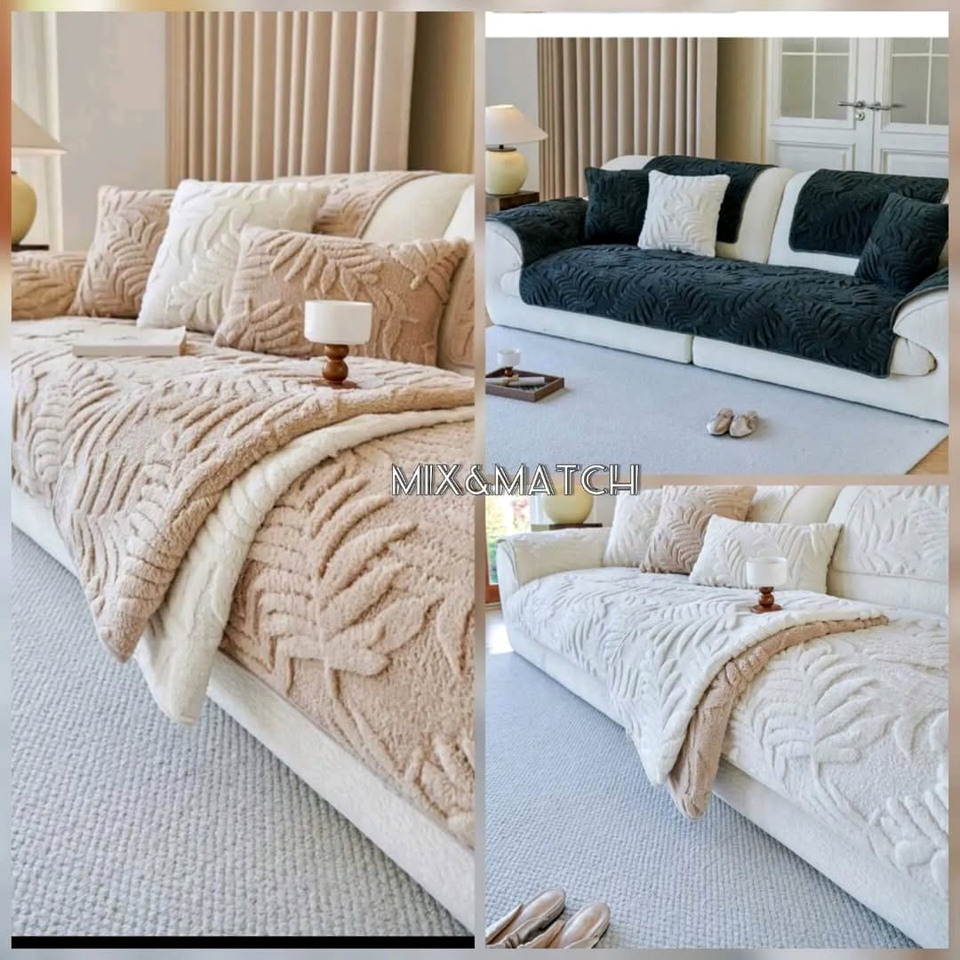 sofa with leaf-patterned throw pillows