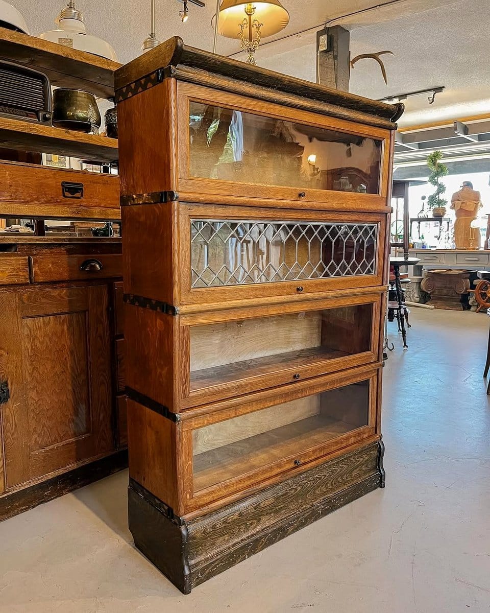 bookshelf with brass planter