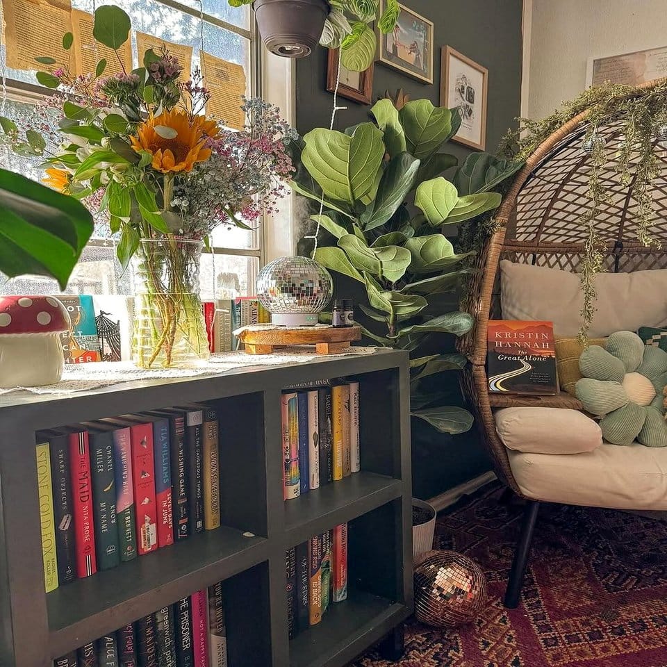 Eclectic bookshelf with plants and boho decor