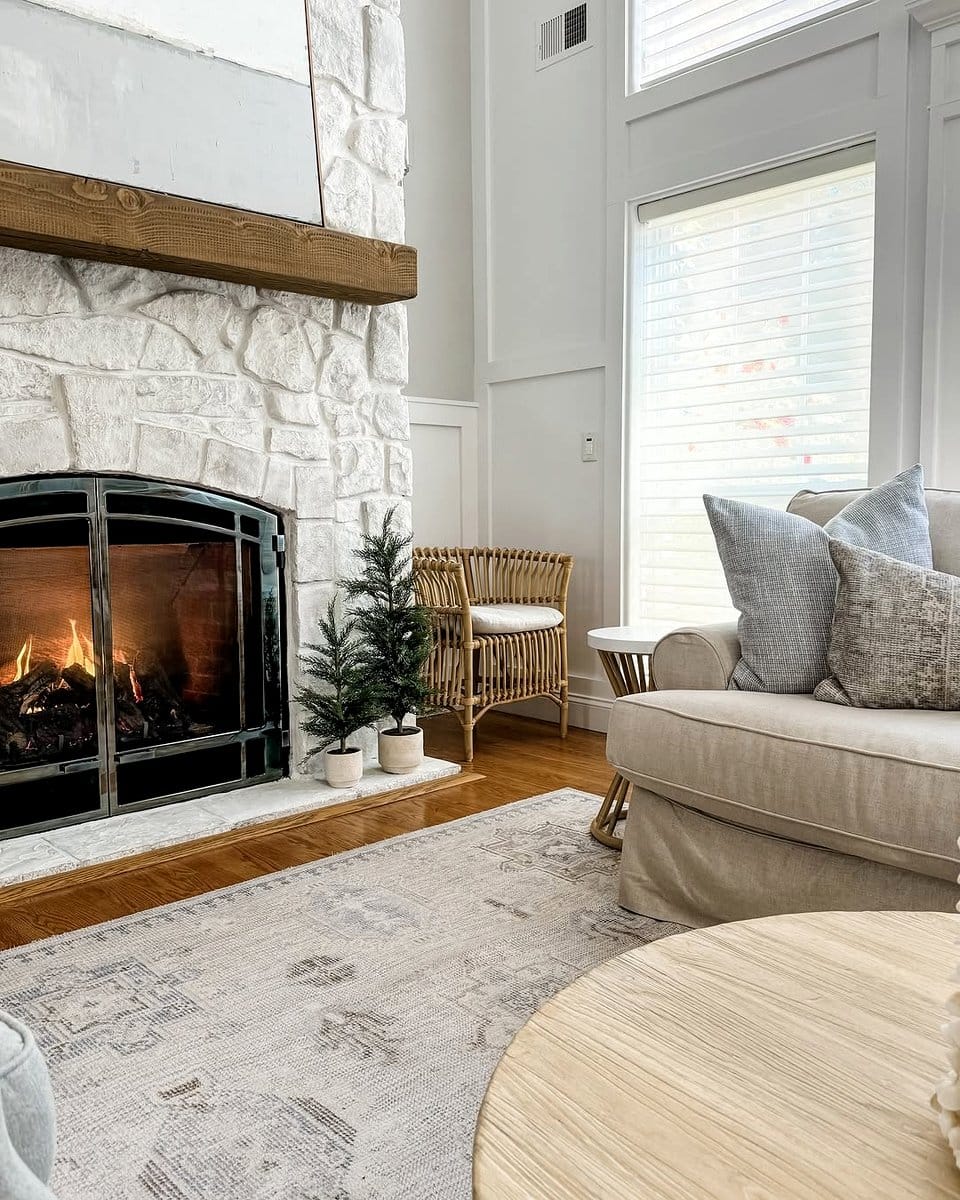 symmetrical plants on fireplace mantle