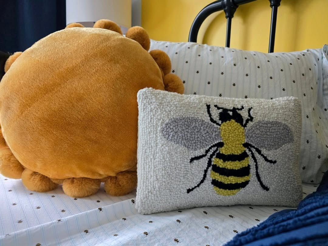 bright yellow accent wall in bedroom