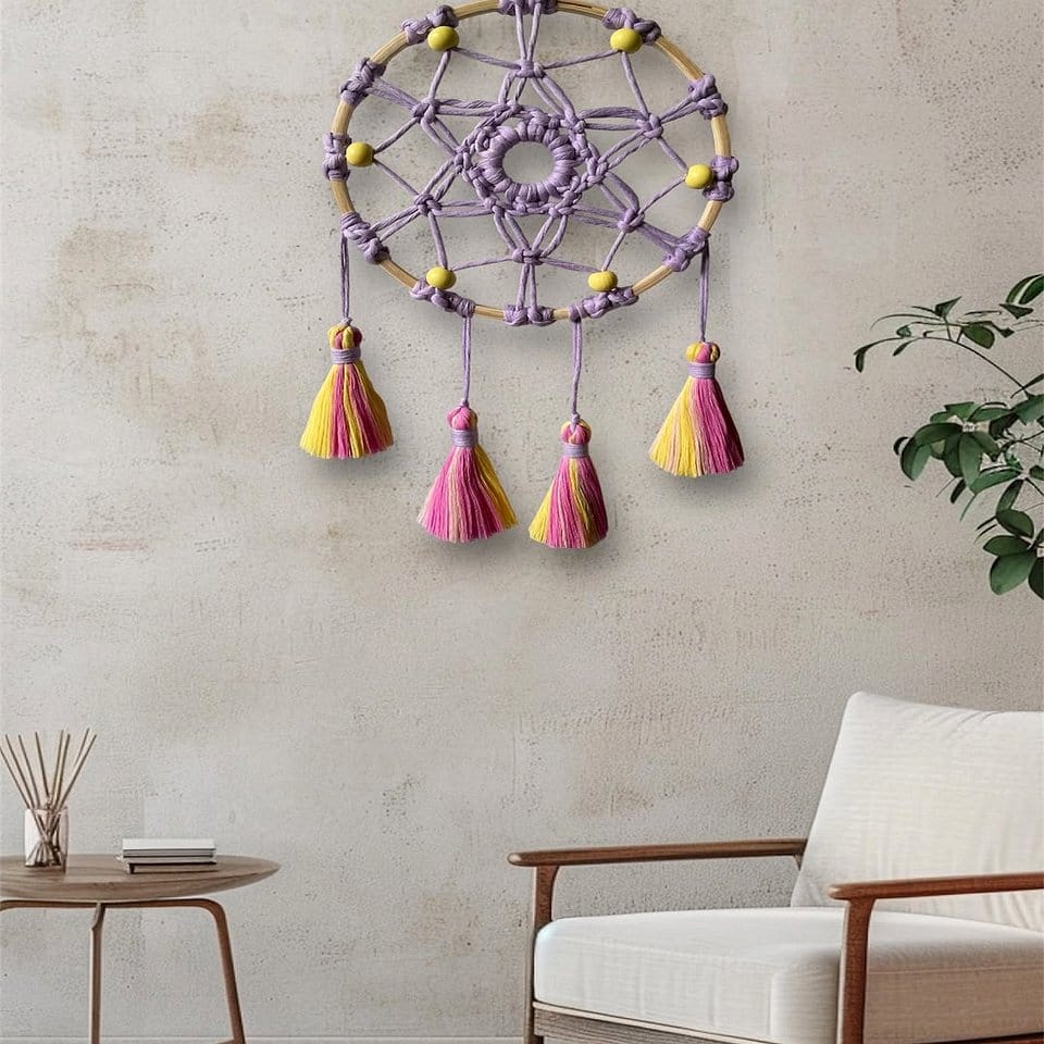 Dreamcatchers hanging among plants