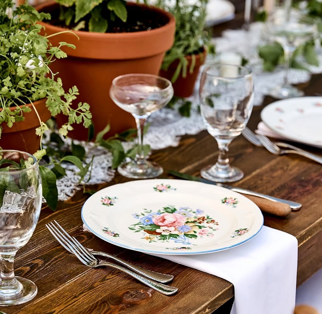 Low wooden table with potted plants