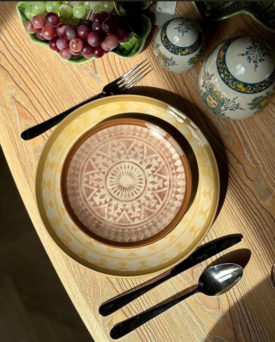 colorful ceramic dinnerware set on dining table