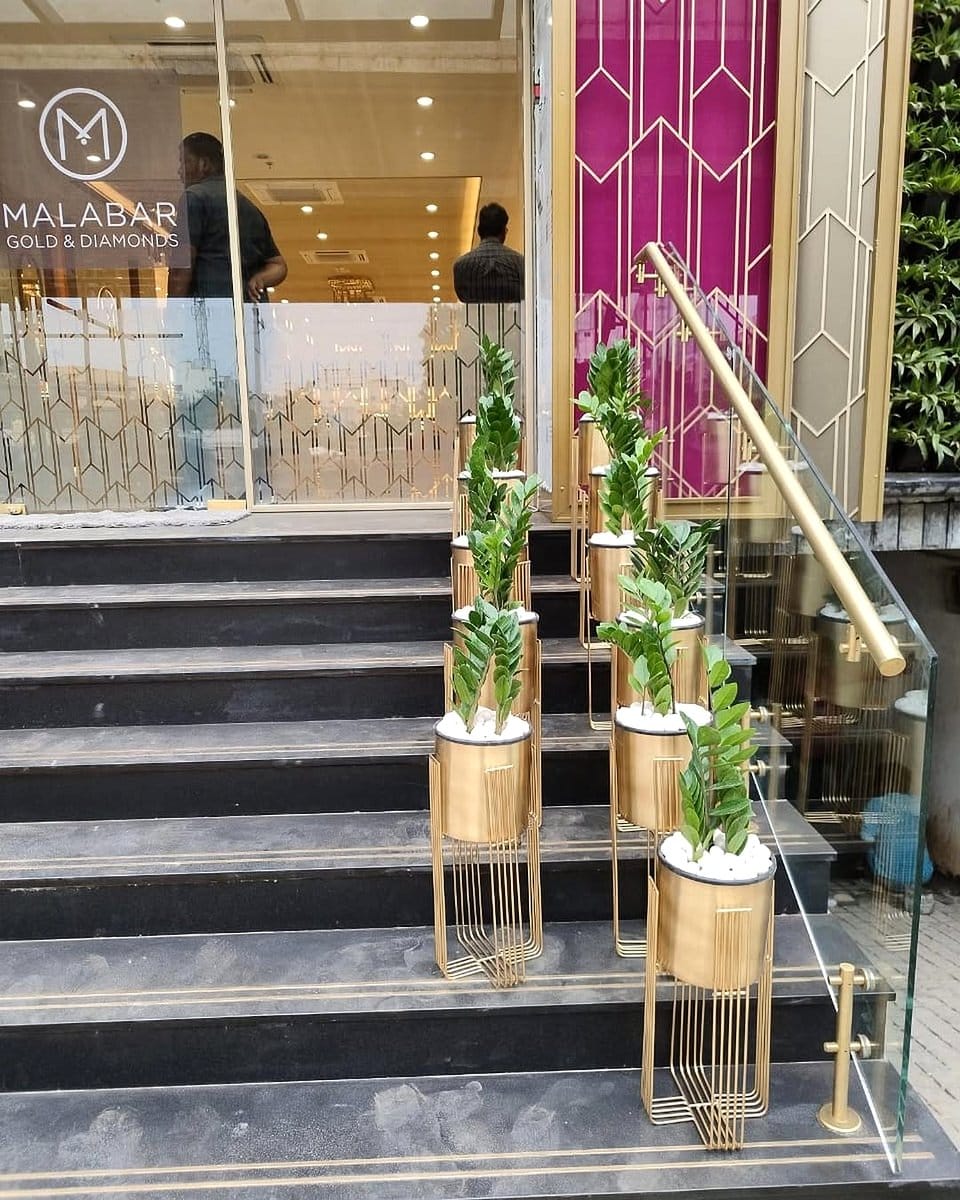 metallic plant pots in office