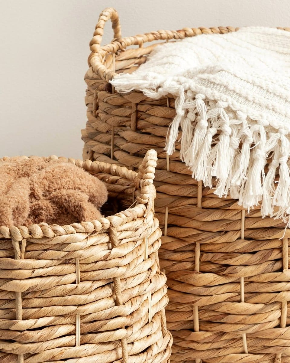 woven wicker basket with blankets