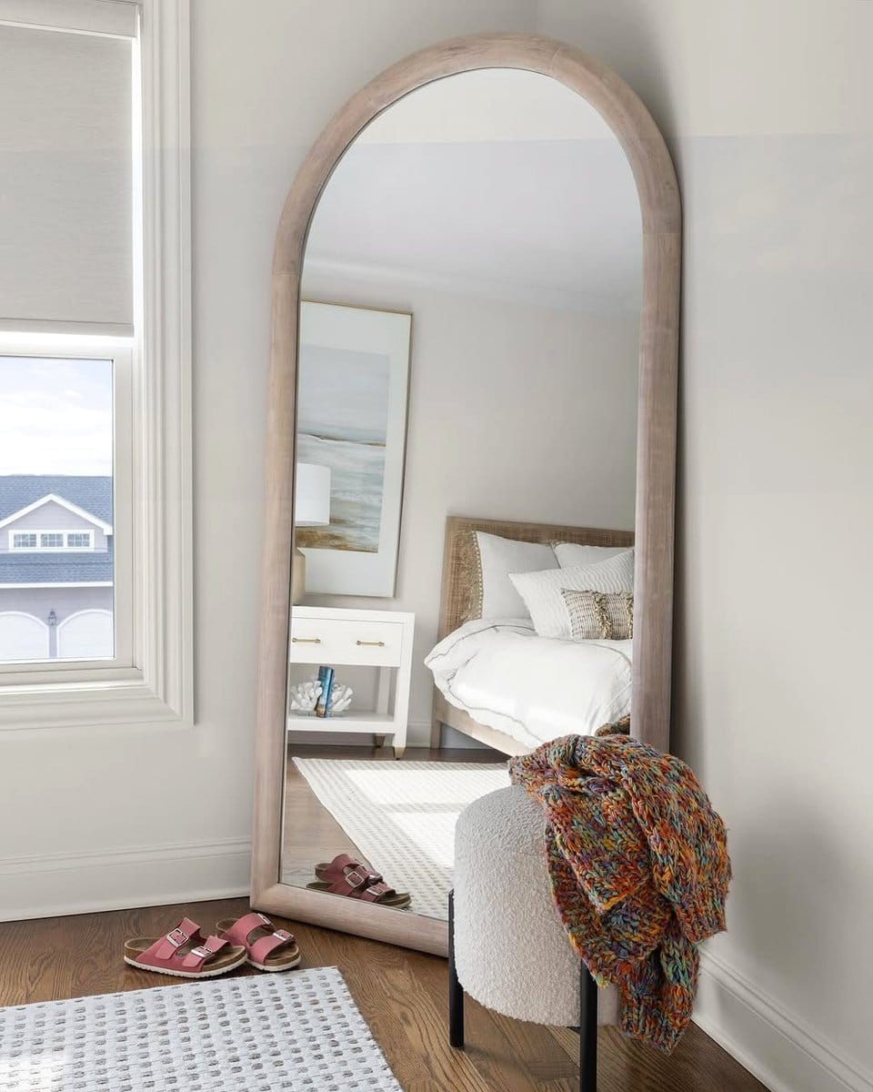 oversized mirror in corner