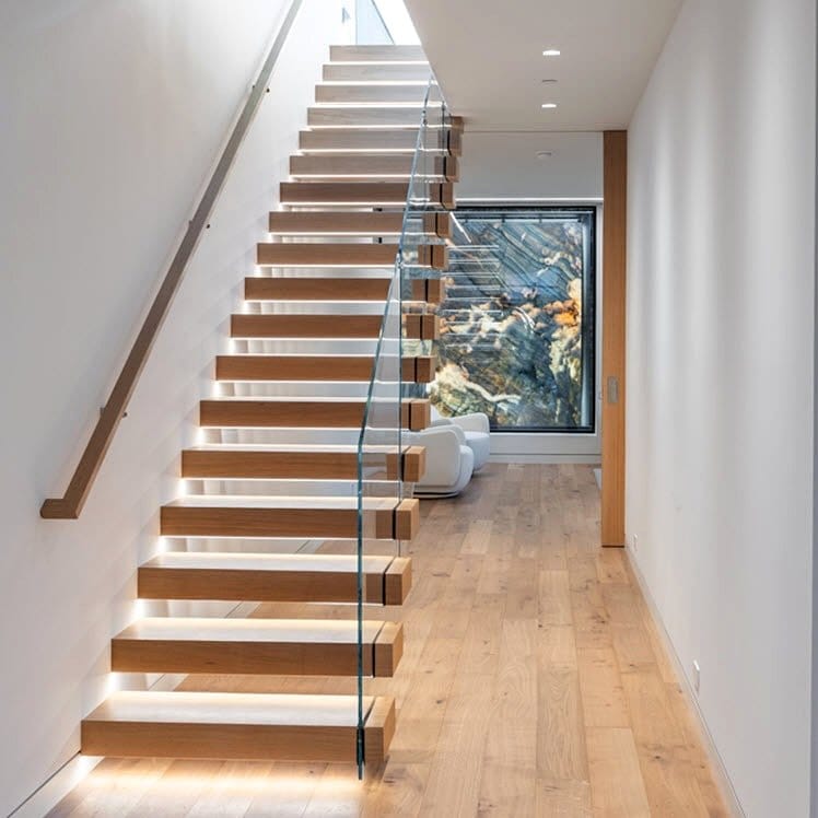 Modern minimalist staircase with glass railings