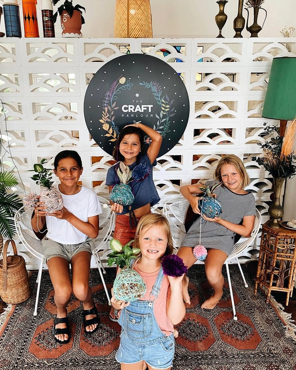 children making kokedama