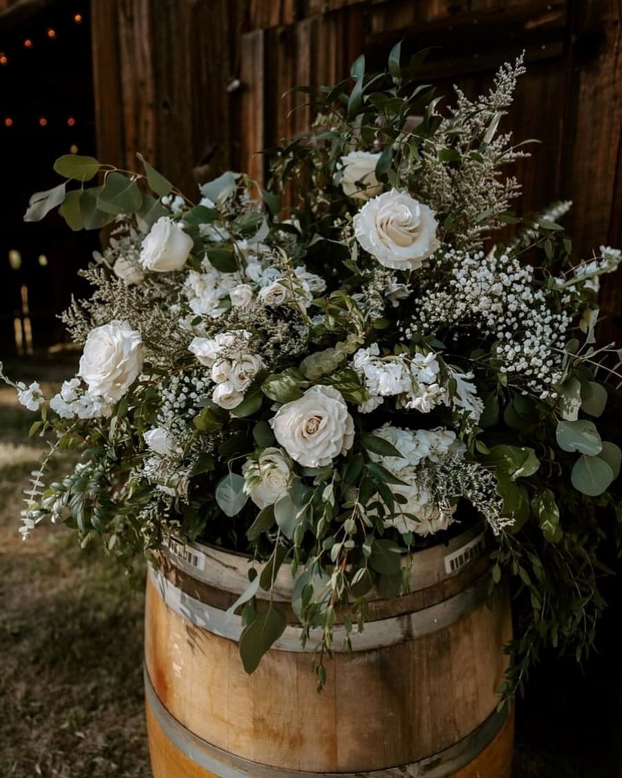 Full wine barrel with roses