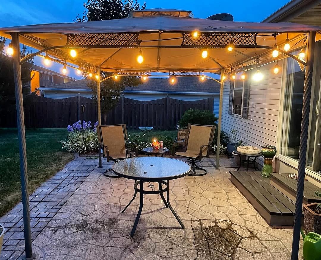 DIY canopy lighting setup in garden
