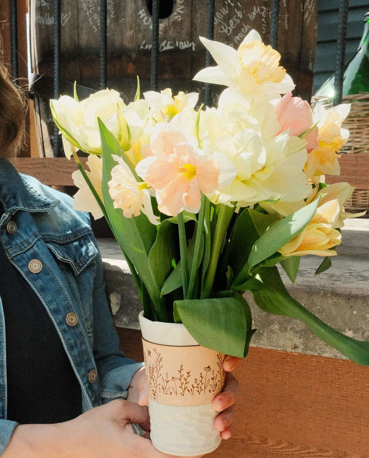 handcrafted leather plant sleeve with artisan tools