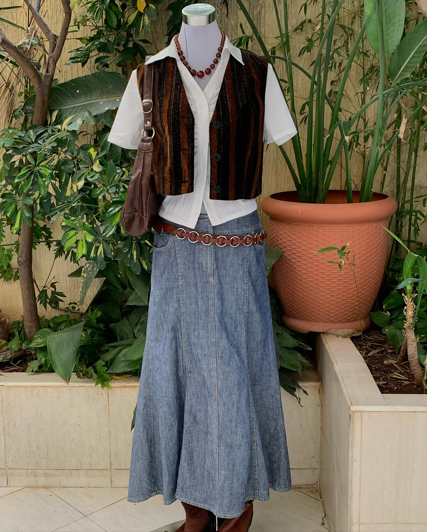elegant white leather plant sleeve on marble countertop
