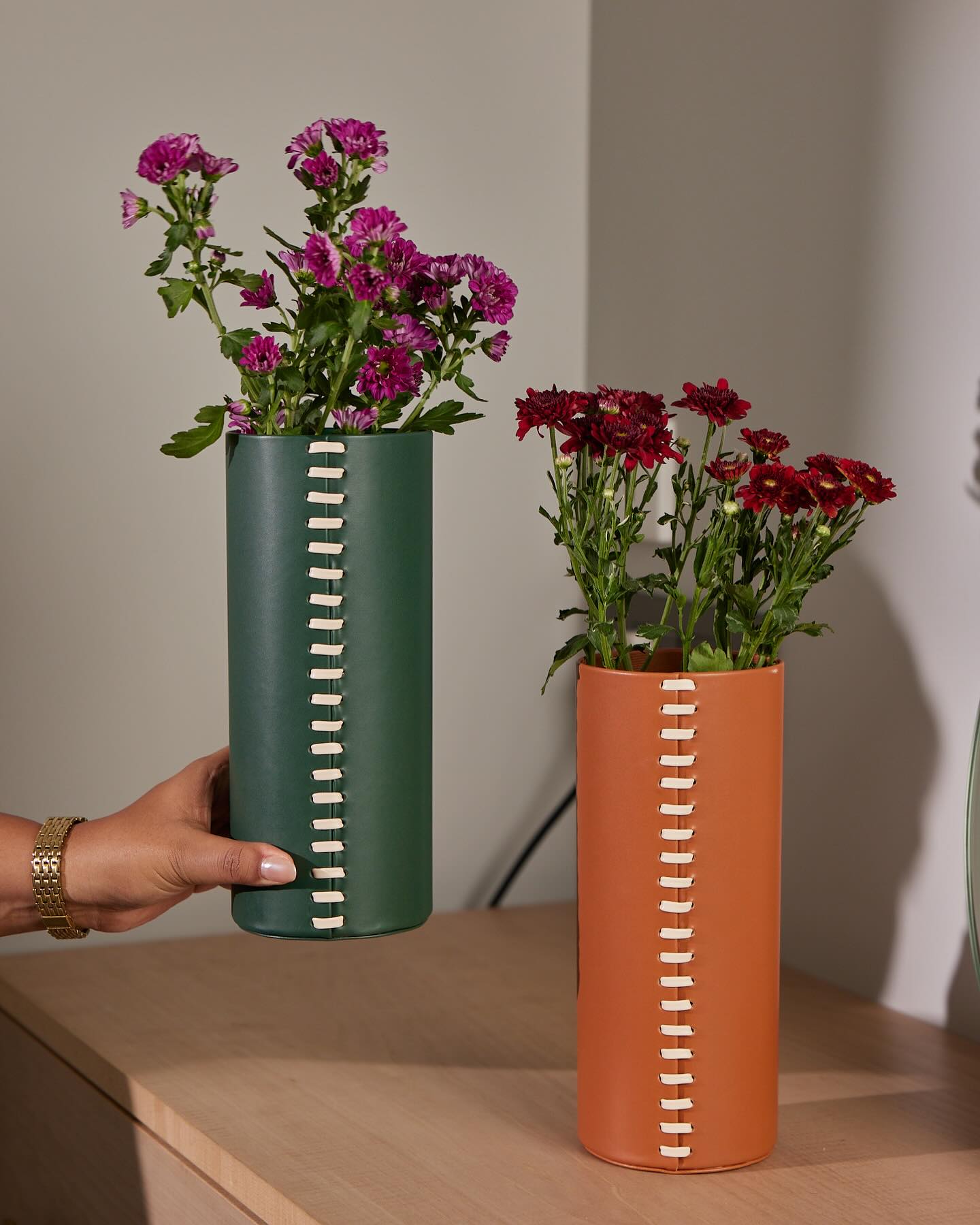 neutral shade leather plant sleeve in neutral room