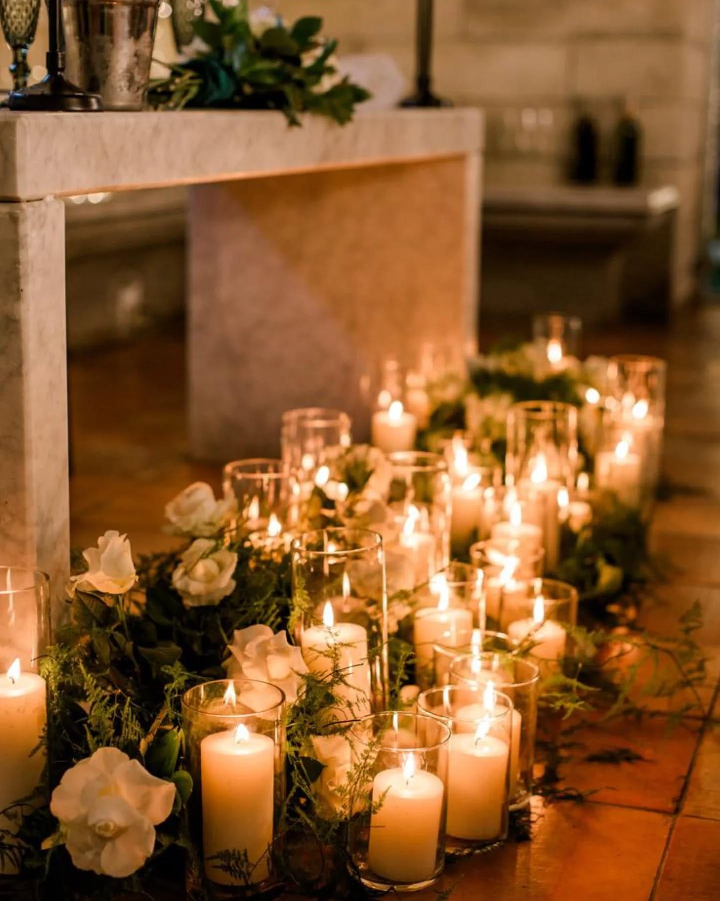 candles and plants in alcove