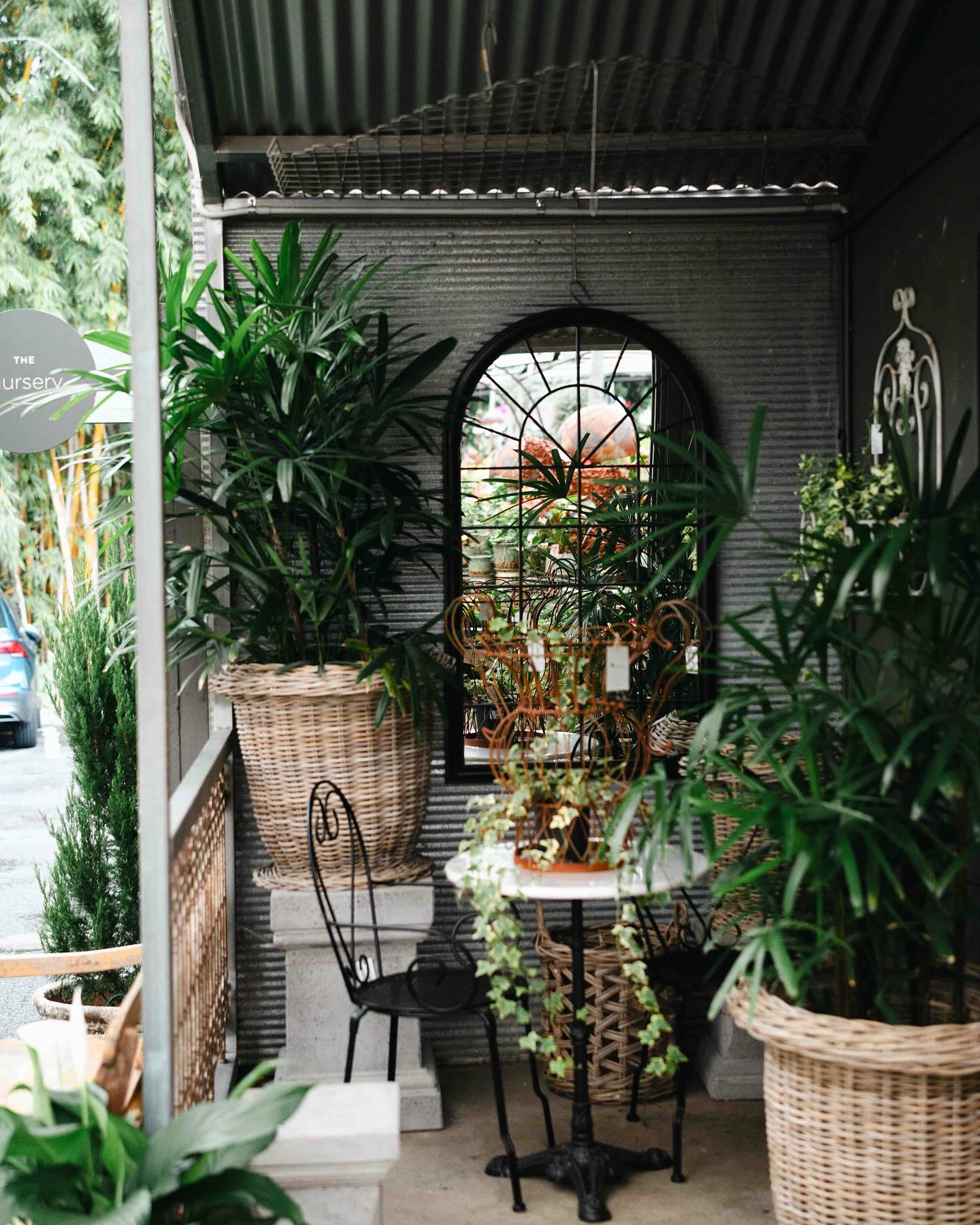 mirror reflecting balcony plants