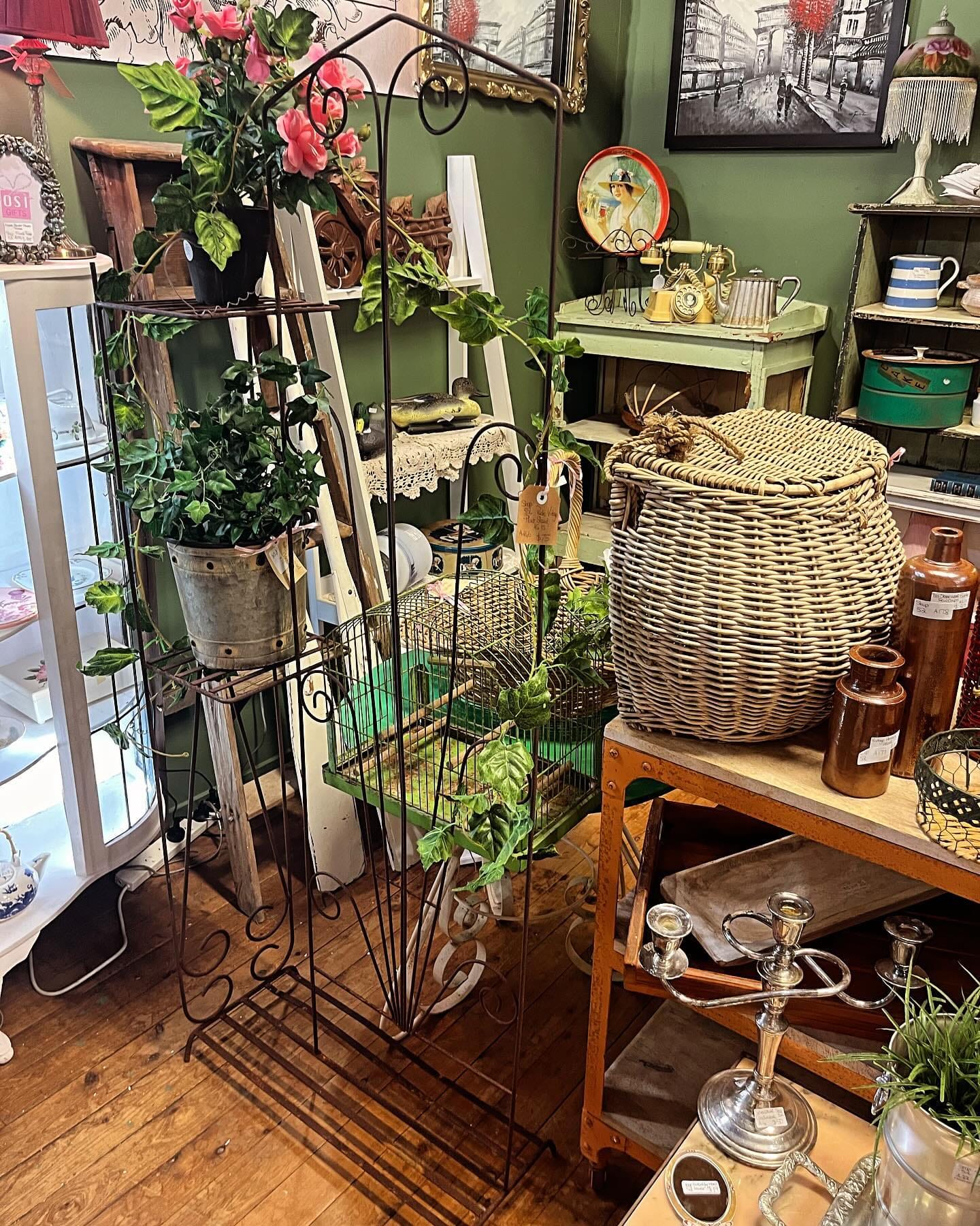 Rustic iron stand with farmhouse-style planters