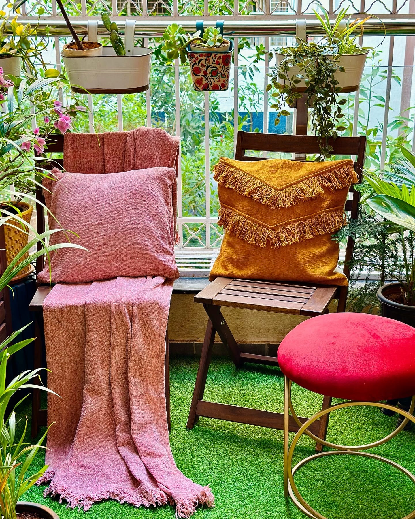 Boho throw pillows in a plant nook