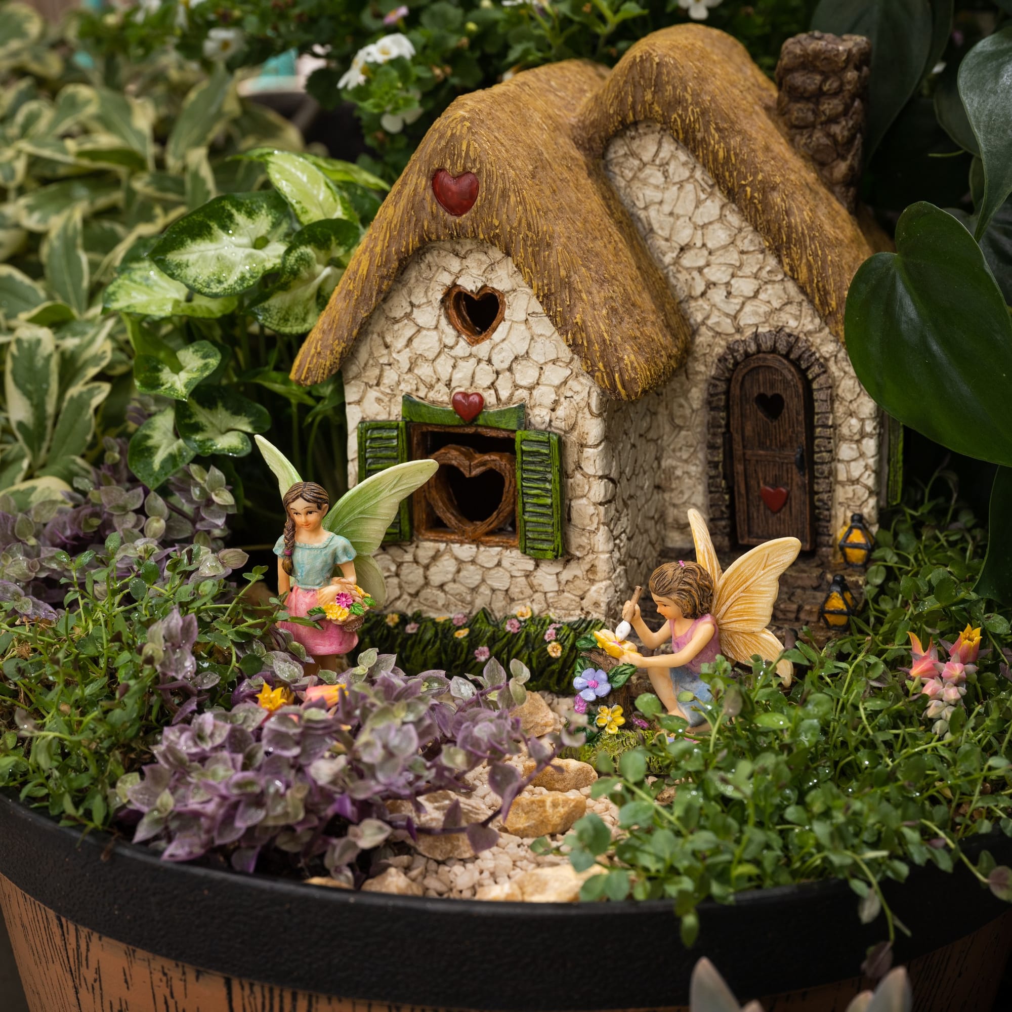 fairy garden on stacked logs