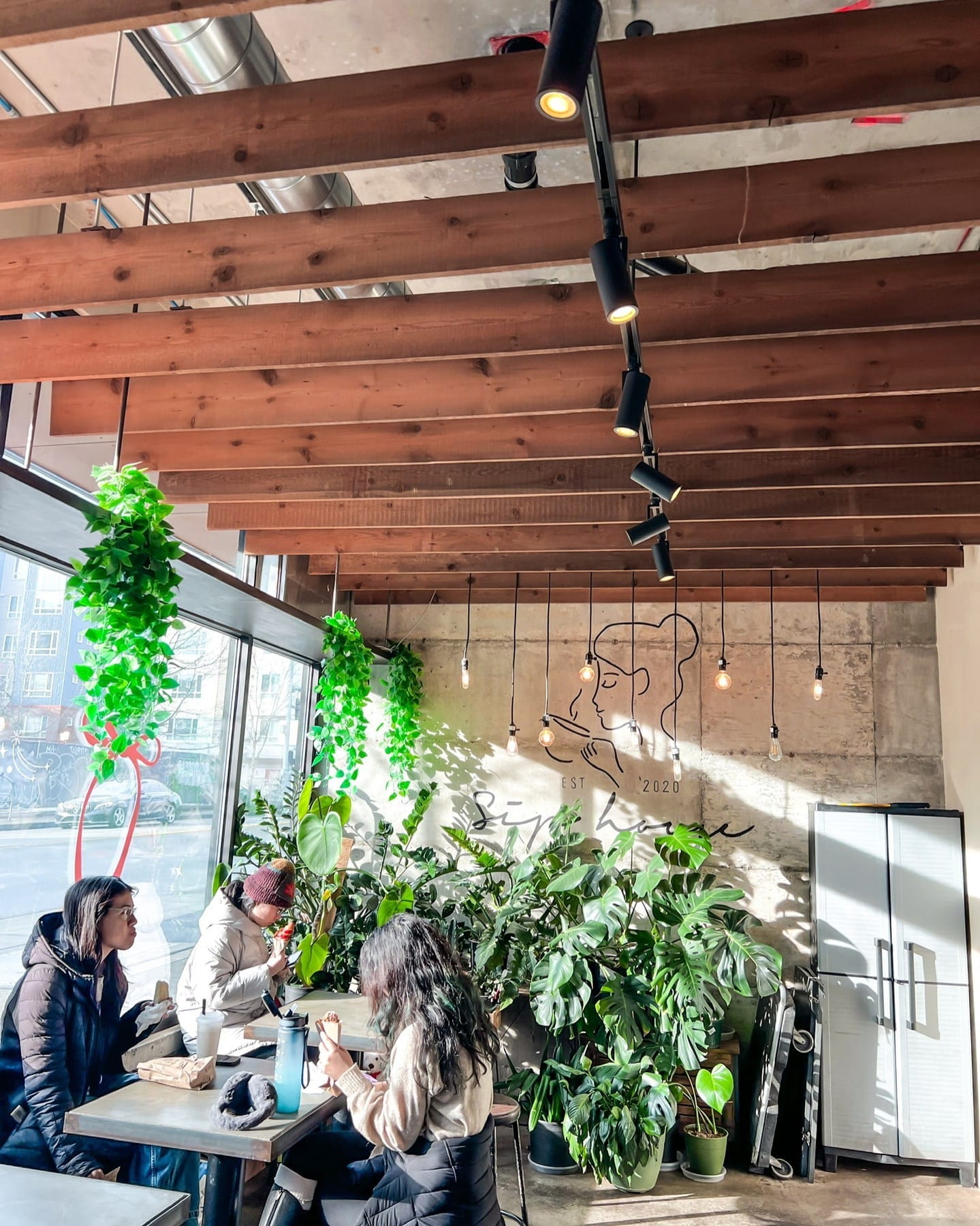 person cleaning a window