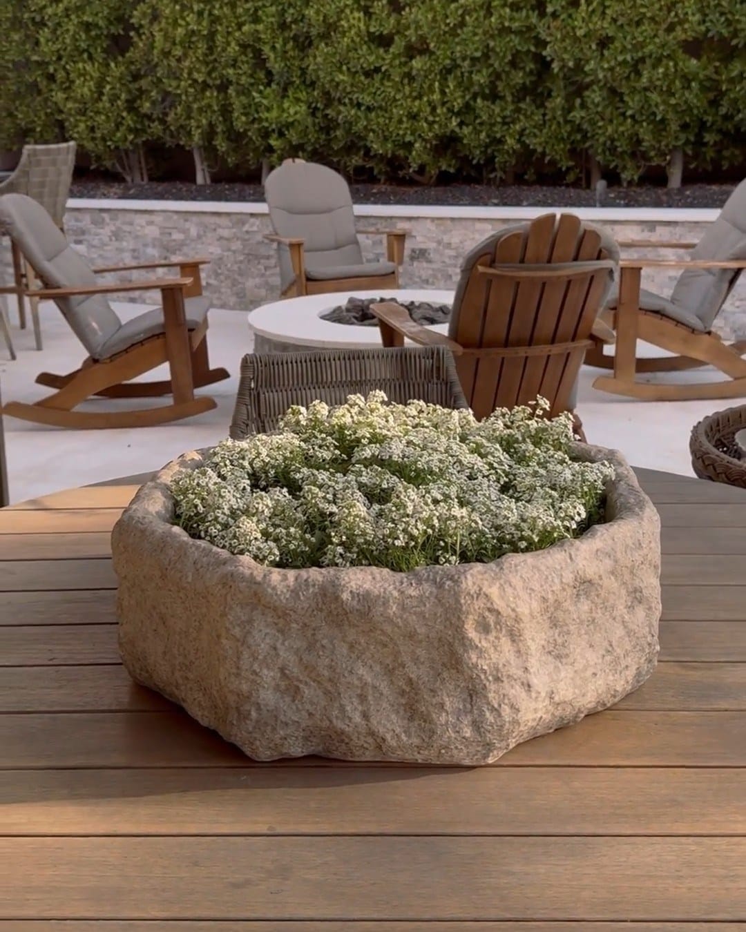 Artistic wooden crate rock garden with succulents