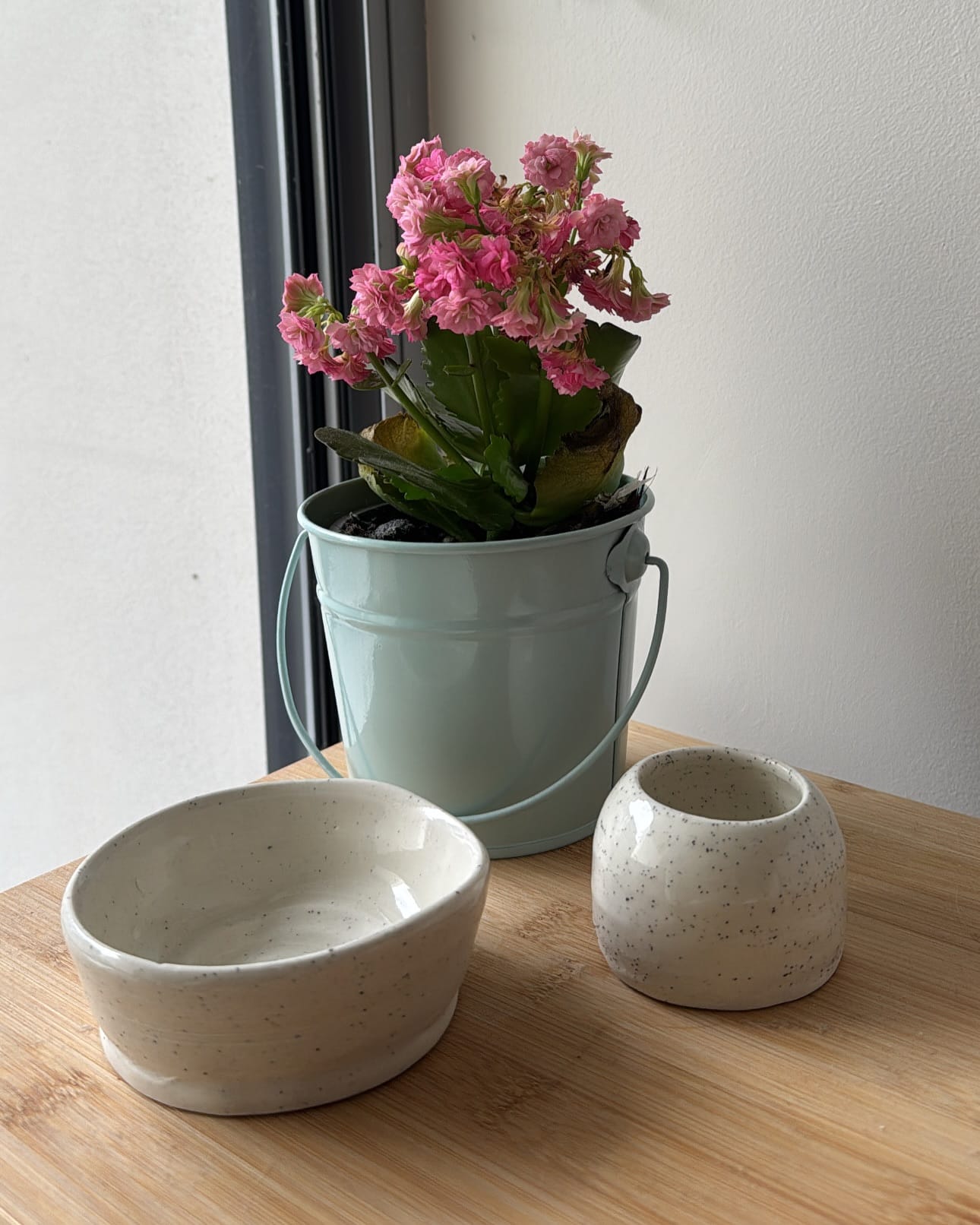 neutral ceramic bowl with moss