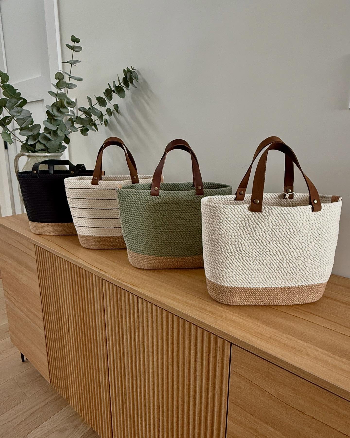 woven basket with scarves and keys