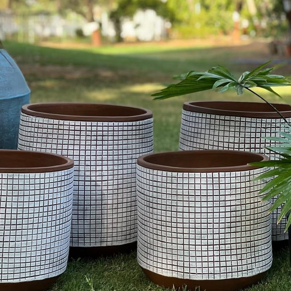 colorful plastic pots on patio