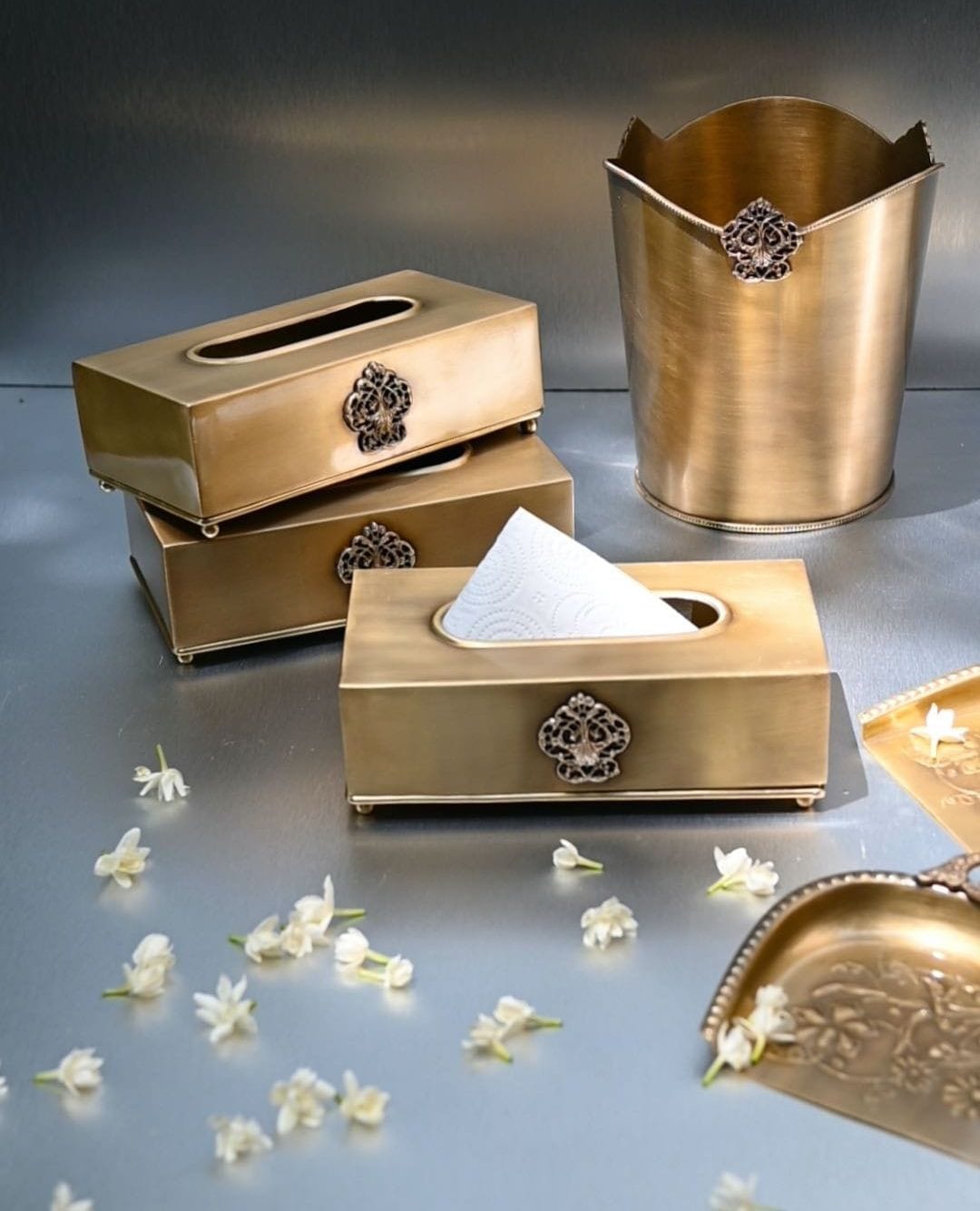 brass pots with indoor palm