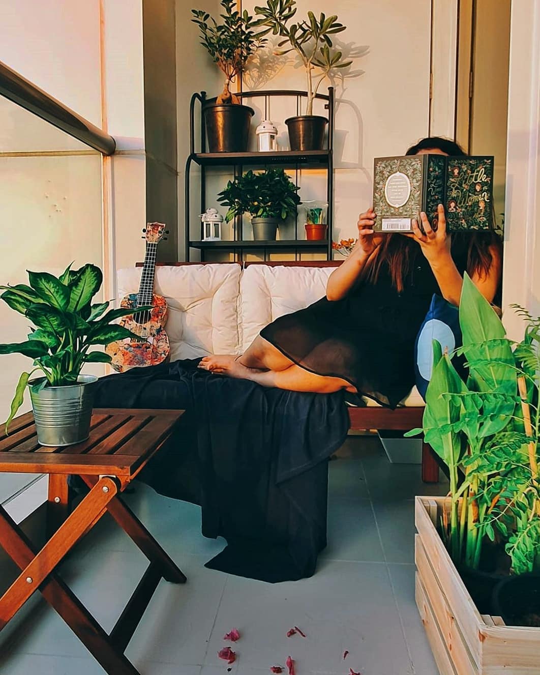 Reading nook with clay pots and cozy chair