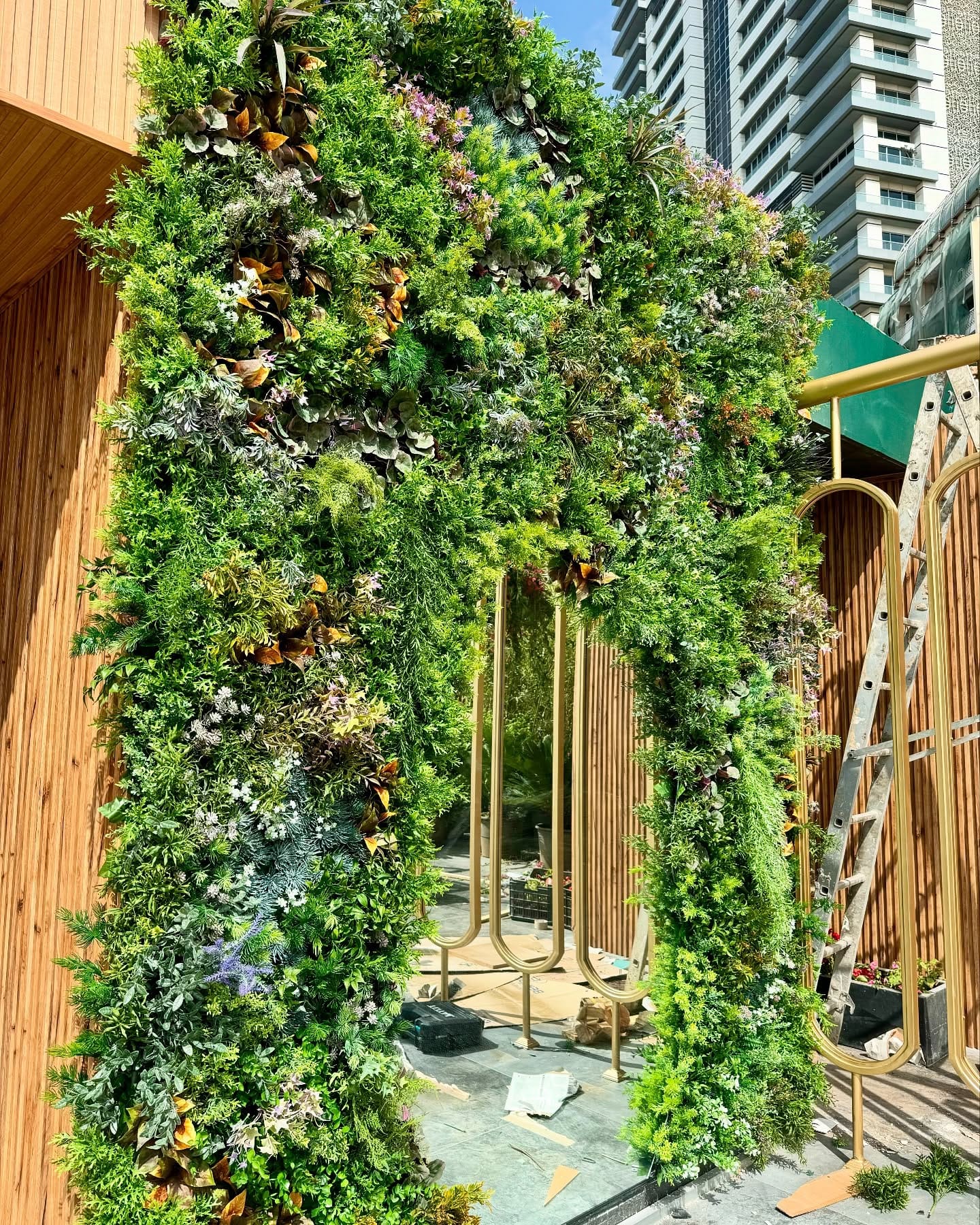 Lush cascading wall-mounted plant display