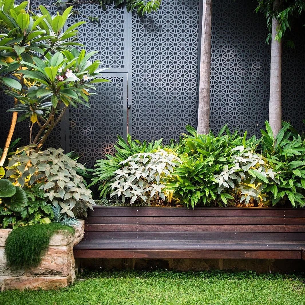 Wooden bench with built-in planters
