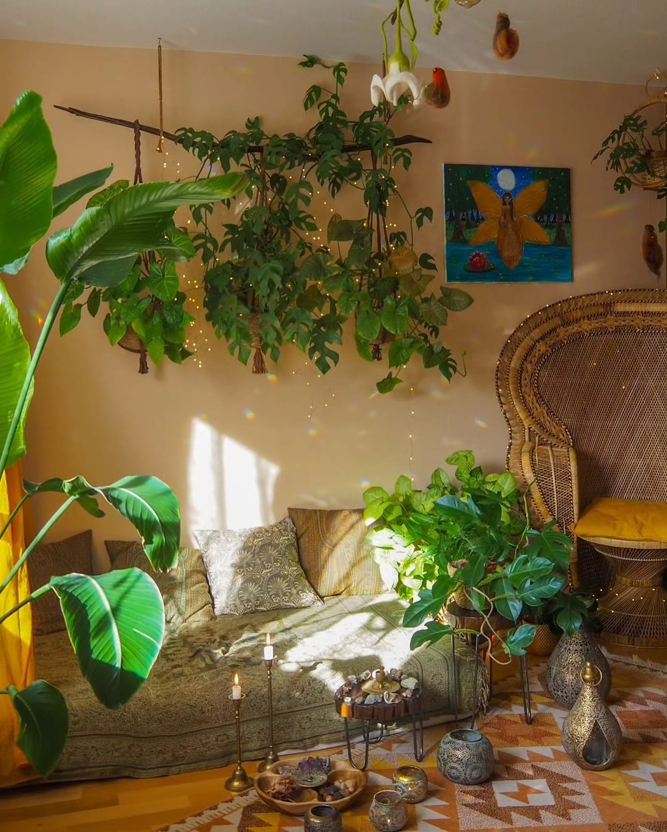 Simple rattan shelf with monochrome pots and plants