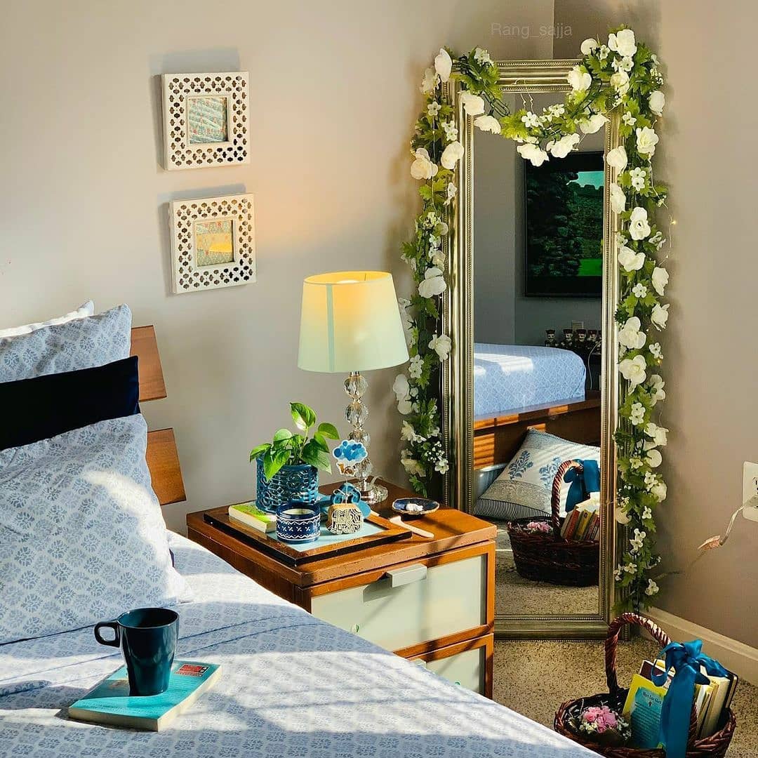 mirror reflecting plant shadow