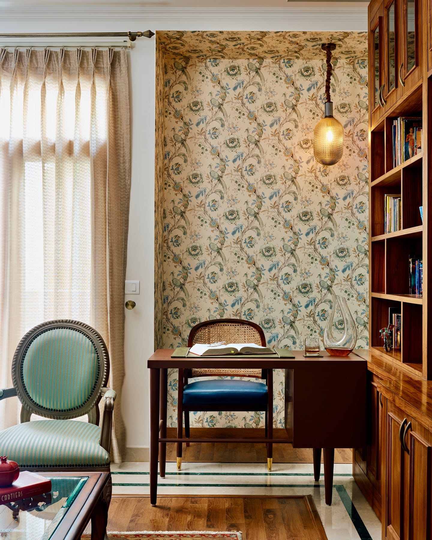 lit corner bookshelf with books