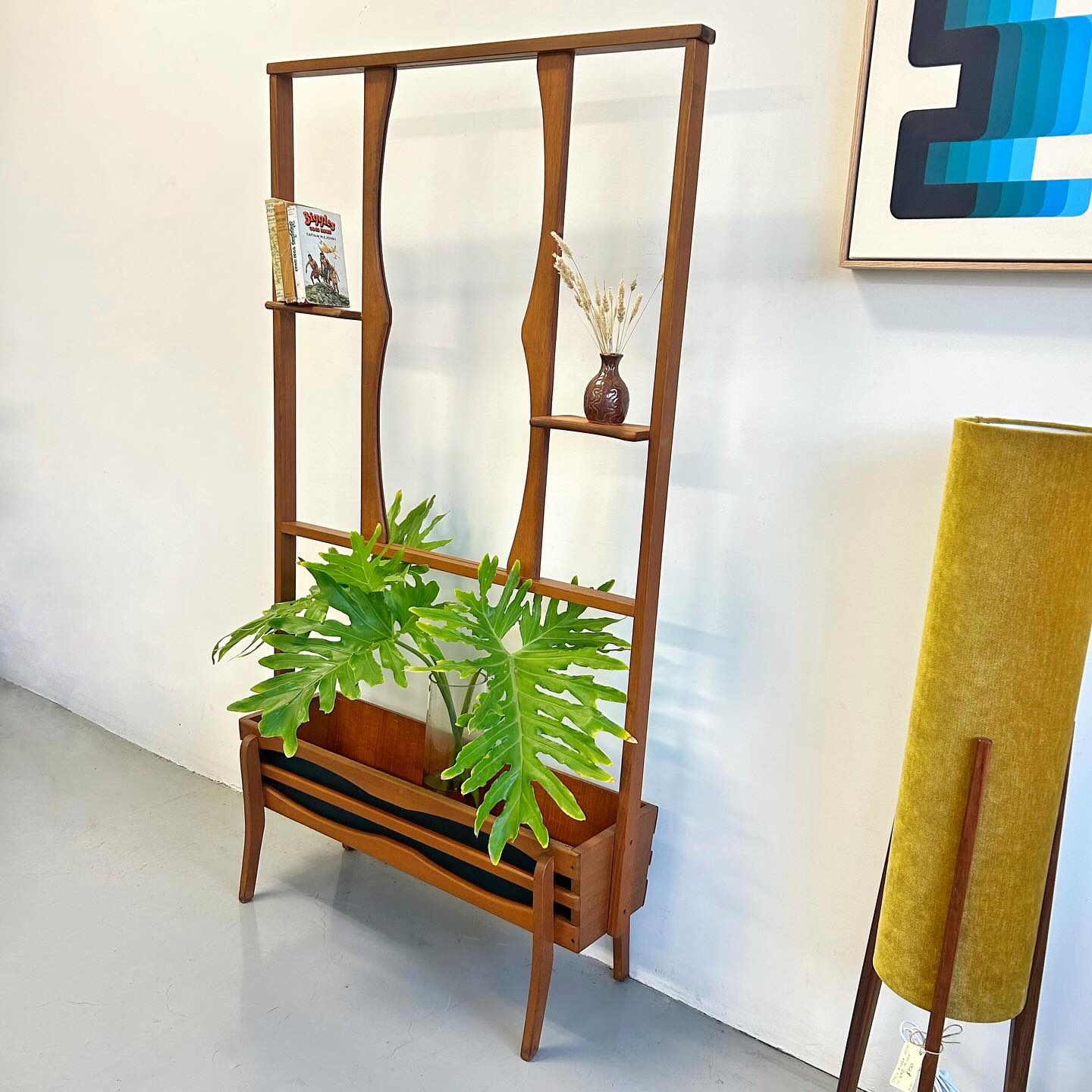 Innovative wooden crate wall divider with integrated plants