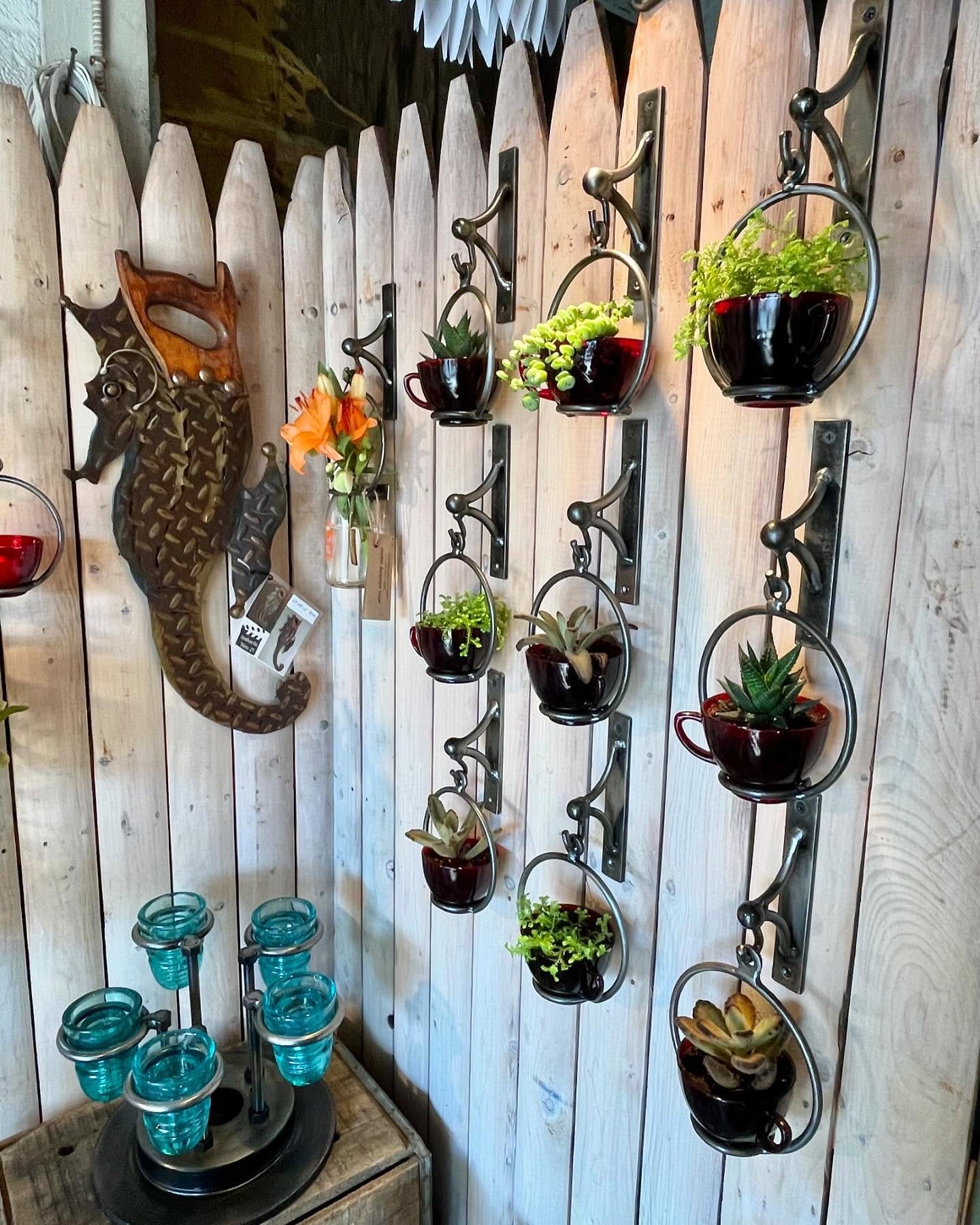 Vintage can with candles and succulents