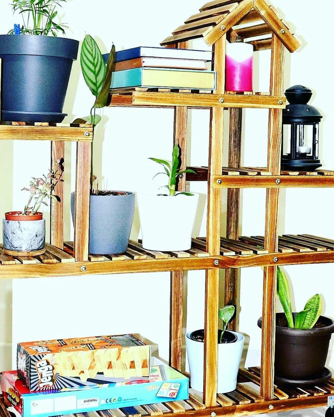 Compact corner plant stand with cascading plants