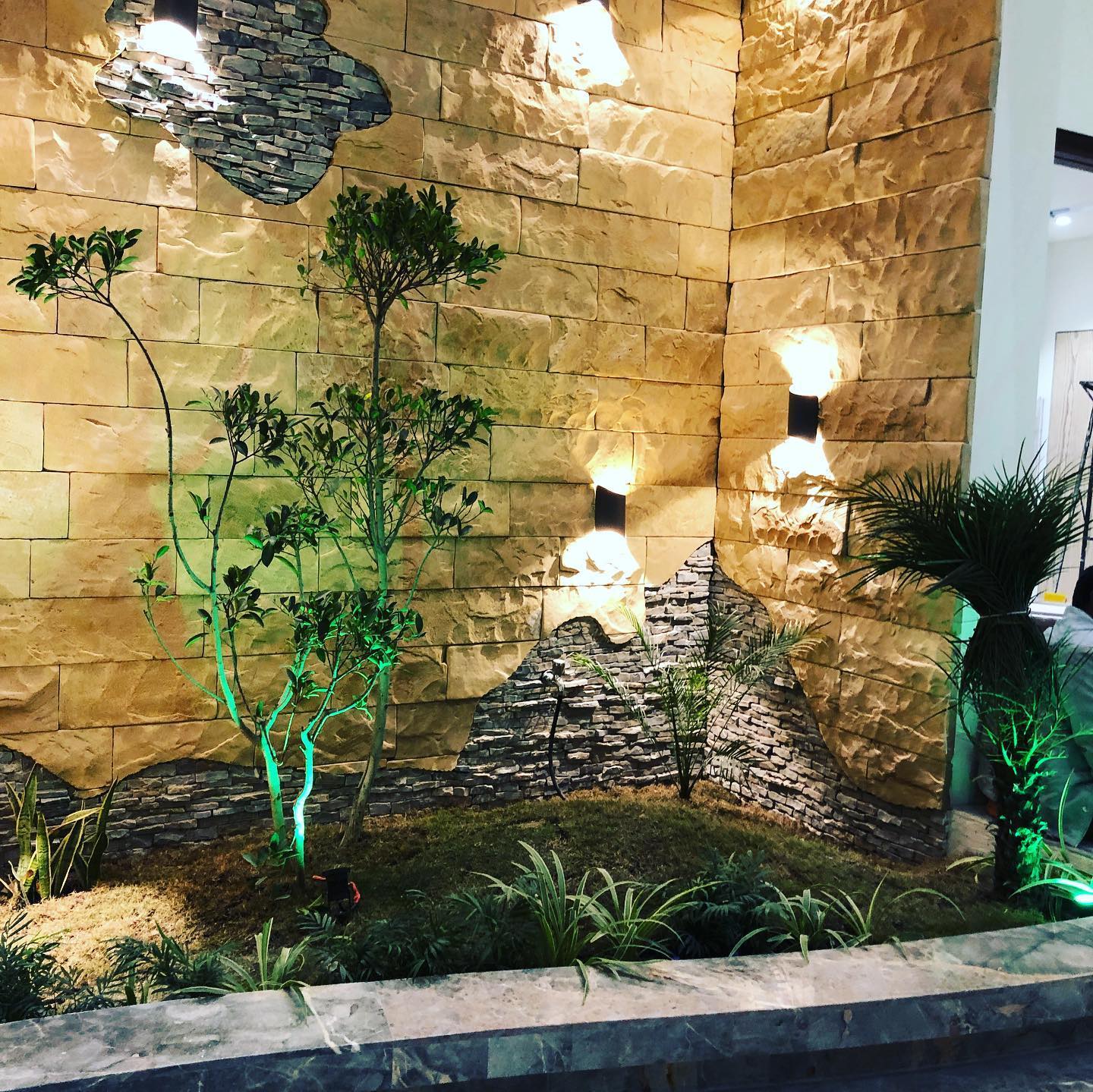 Natural stone pebbles in plant arrangements