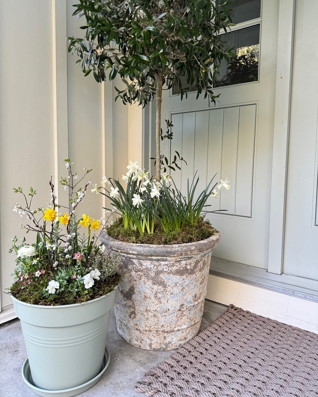 seasonal display with brass planter