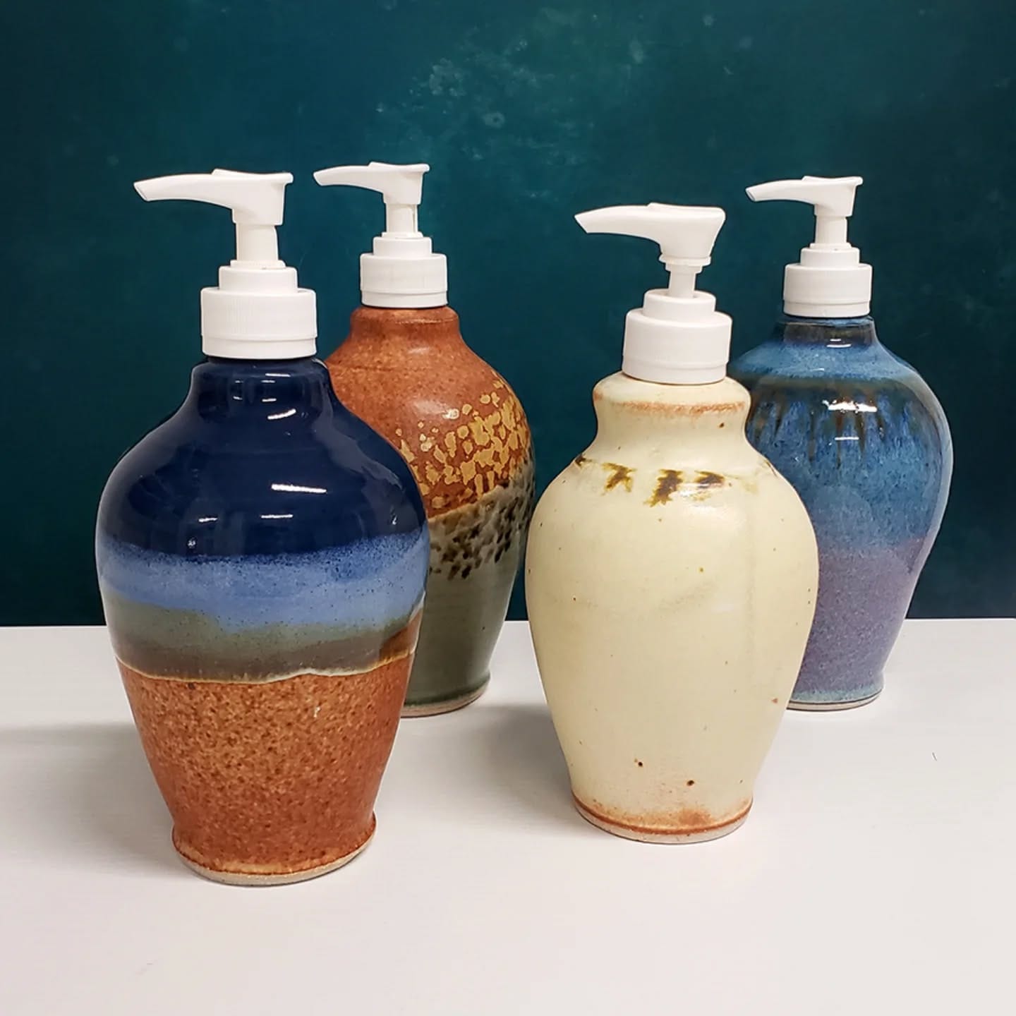ceramic soap dispenser on sink