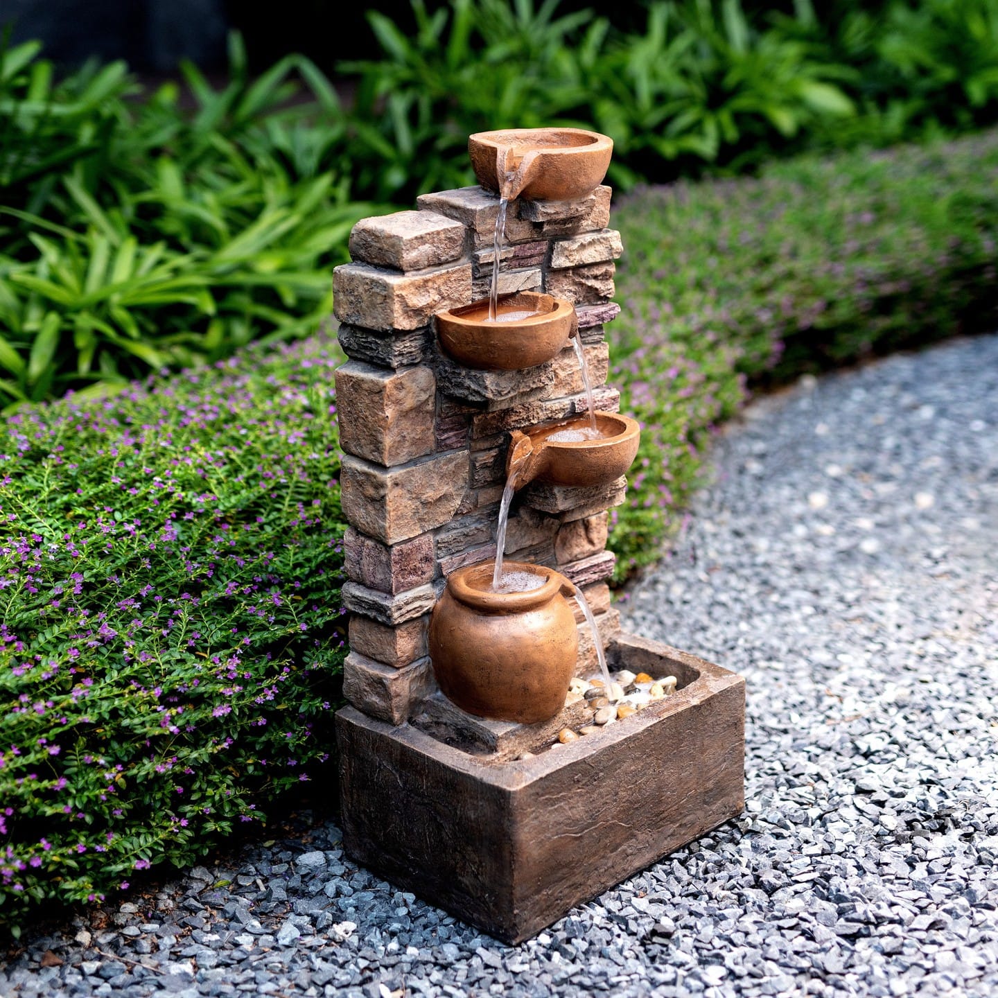 terra cotta fountain in garden