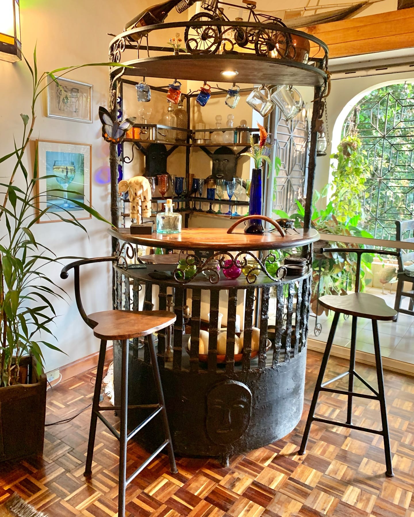 Wrought iron staircase railing with rustic wooden steps