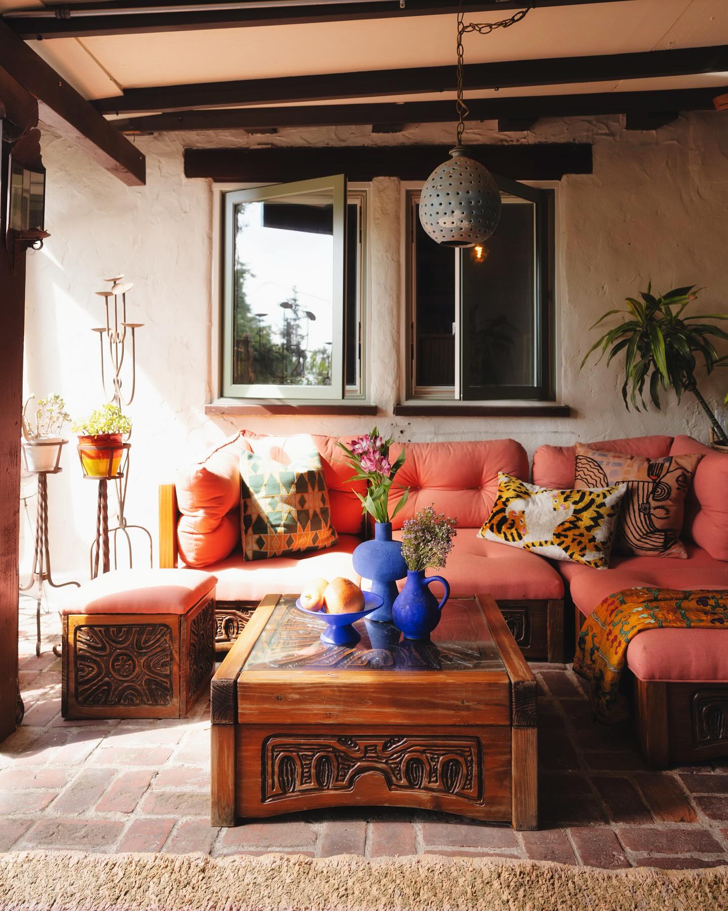 Calming sage green and terracotta accent wall