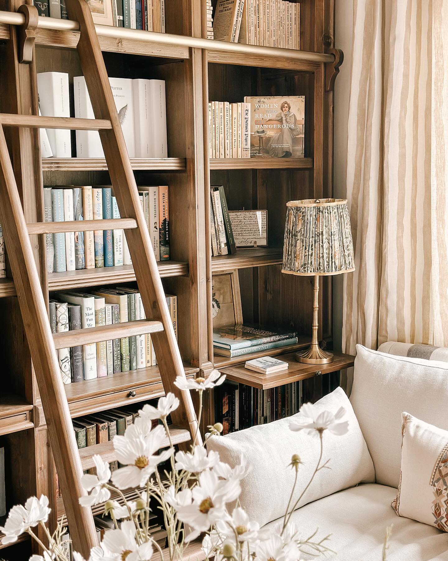 herb ladder with potted plants